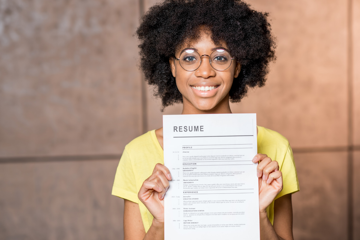 Student holding resume 