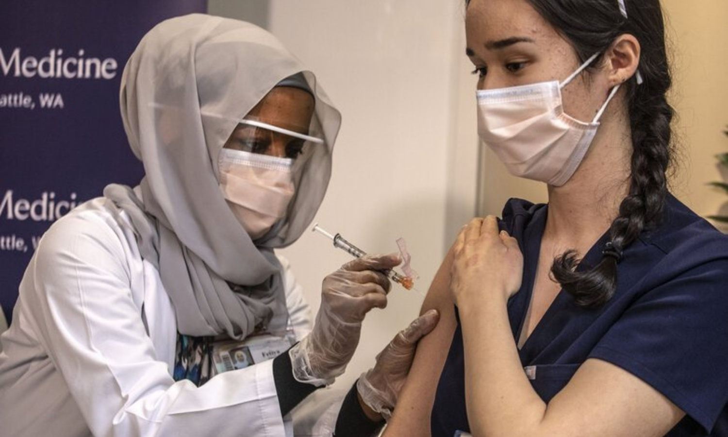 Woman receiving COVID vaccine 