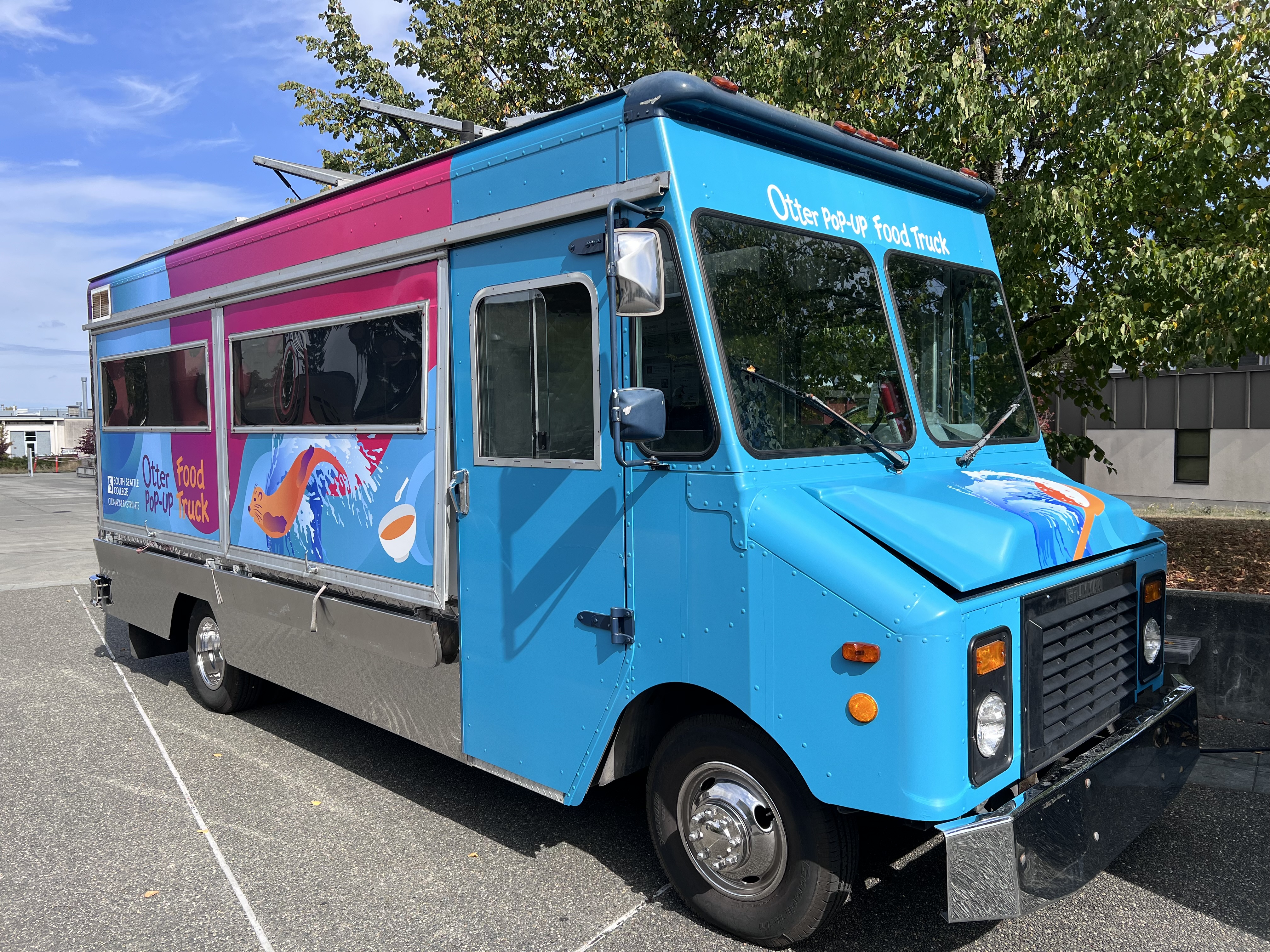 The Otter Pop Up Food Truck parked in the clock tower plaza